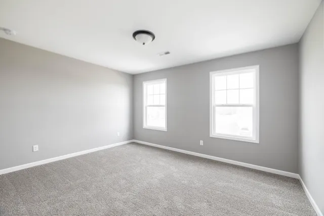 a view of a hallway with closet area