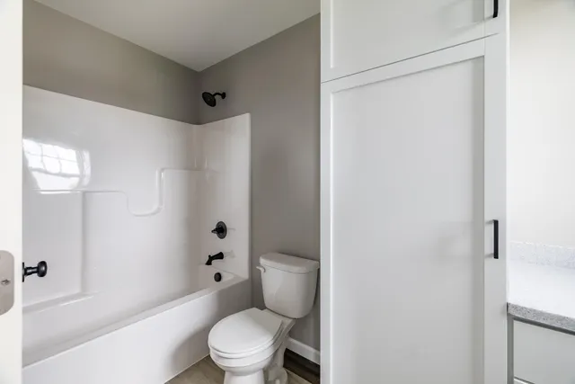 a bathroom with a sink vanity and a mirror