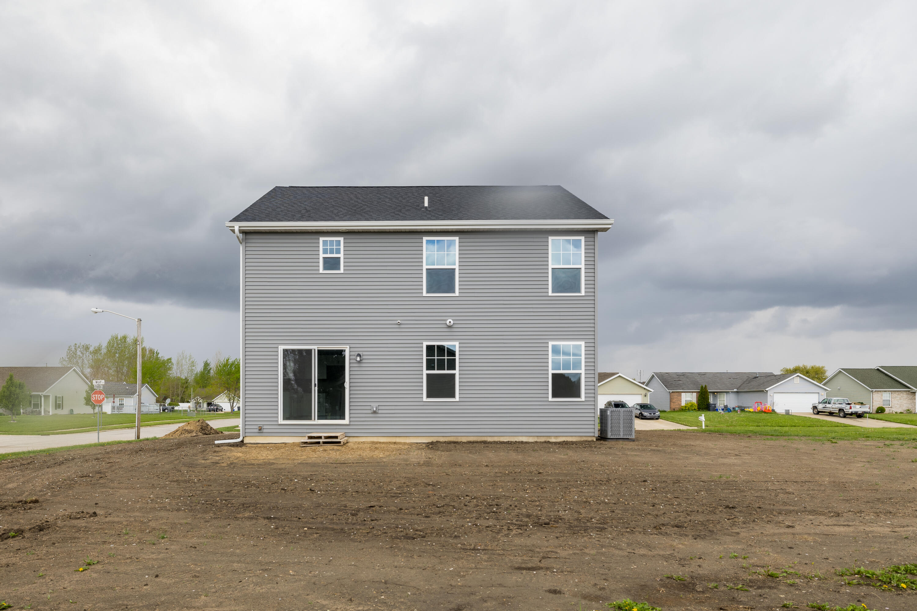 403 Wolf Street Rensselaer, IN 47978 - Photo 5 of 38 a front view of a house with a yard