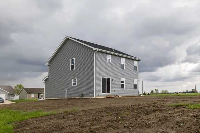 a house view with a backyard space