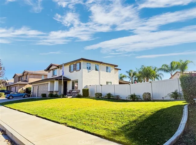 a view of swimming pool with outdoor seating and yard in back