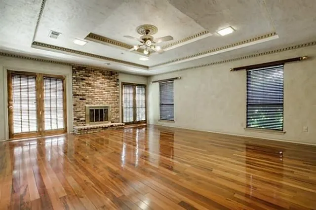 a bathroom with a tub sink shower and mirror