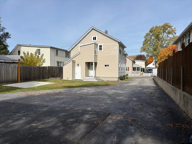 a view of a backyard with a small pool