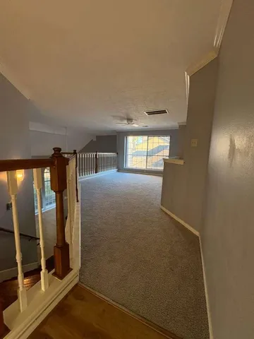a view of entryway with wooden floor