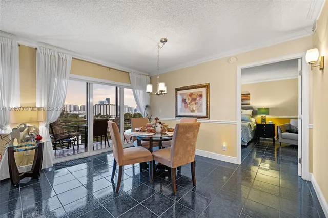 a dining room with furniture window wooden floor