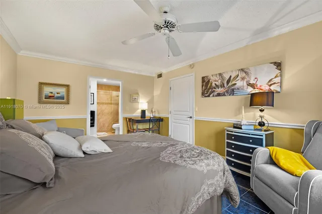 a bedroom with bed and window