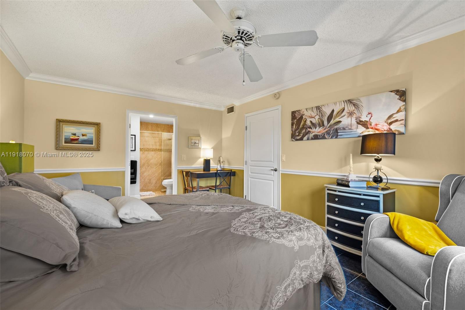 200 Diplomat Parkway, Unit 732 Hallandale Beach, FL 33009 - Photo 18 of 35 a bedroom with a bed and a couch