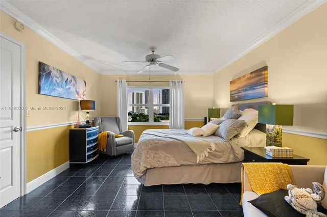 a bedroom with bed and window