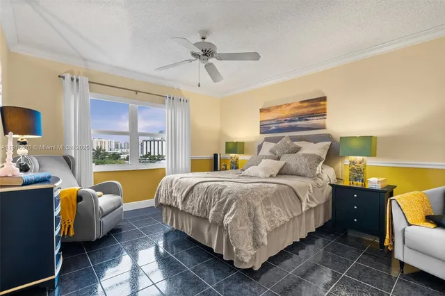 a kitchen with stainless steel appliances granite countertop a sink and a refrigerator