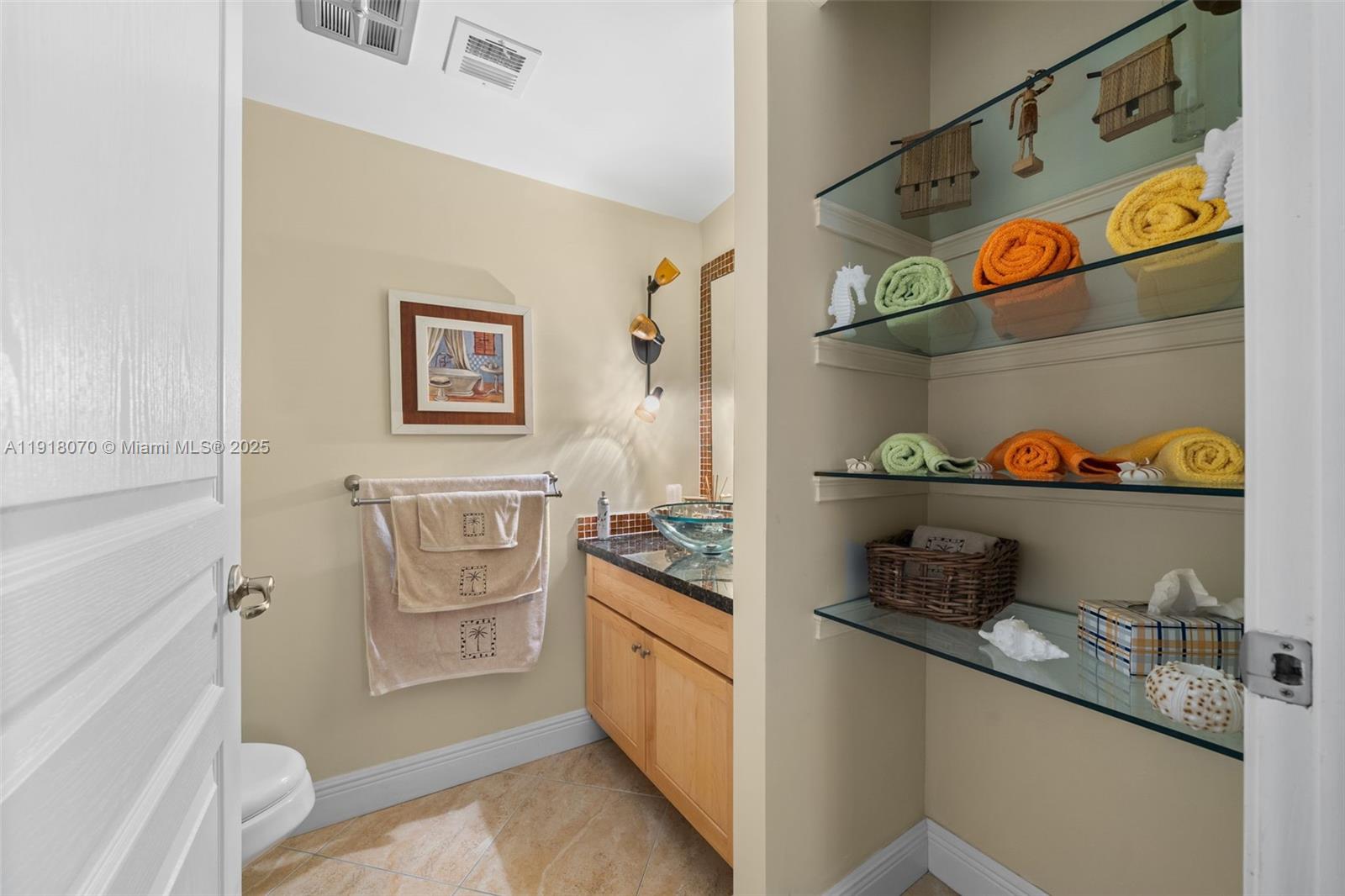 200 Diplomat Parkway, Unit 732 Hallandale Beach, FL 33009 - Photo 22 of 35 a kitchen with stainless steel appliances granite countertop a sink and a refrigerator