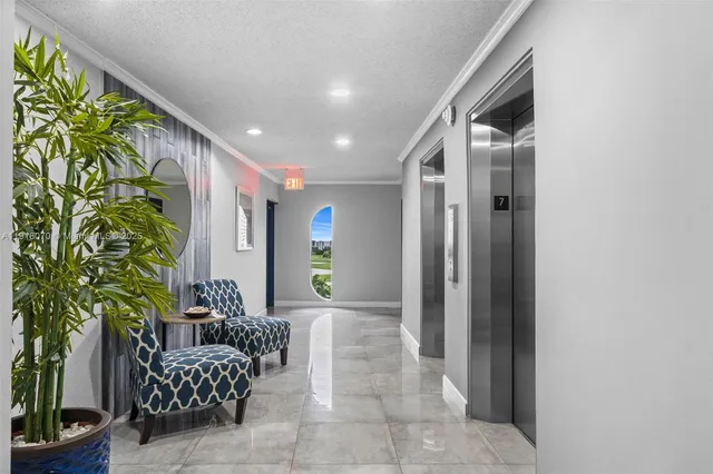 a view of a balcony with furniture