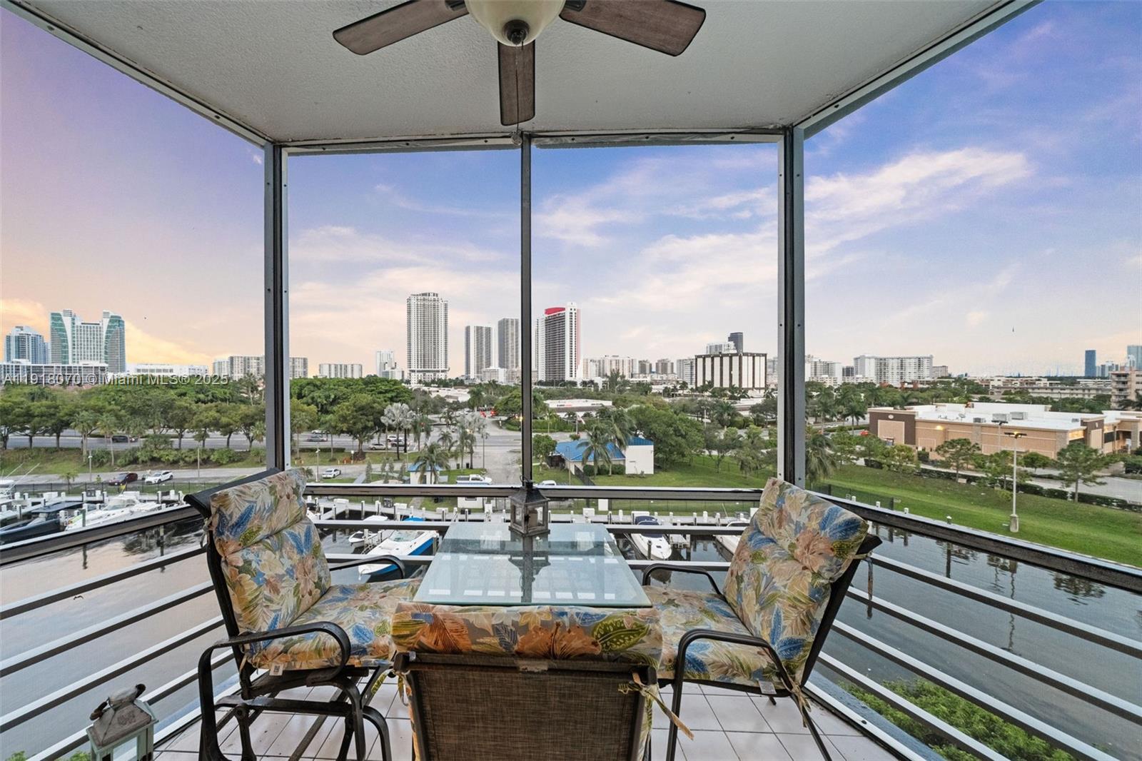 200 Diplomat Parkway, Unit 732 Hallandale Beach, FL 33009 - Photo 26 of 35 a view of a balcony with furniture