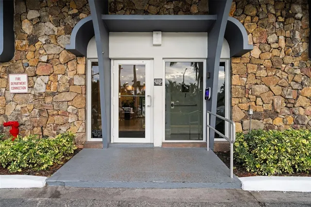 a view of houses with swimming pool
