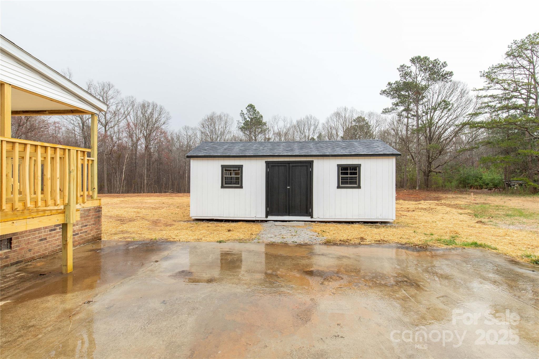 288 John L Hudson Sr Road Lancaster, SC 29720 - Photo 38 of 44 a view of house with backyard and trees in the background