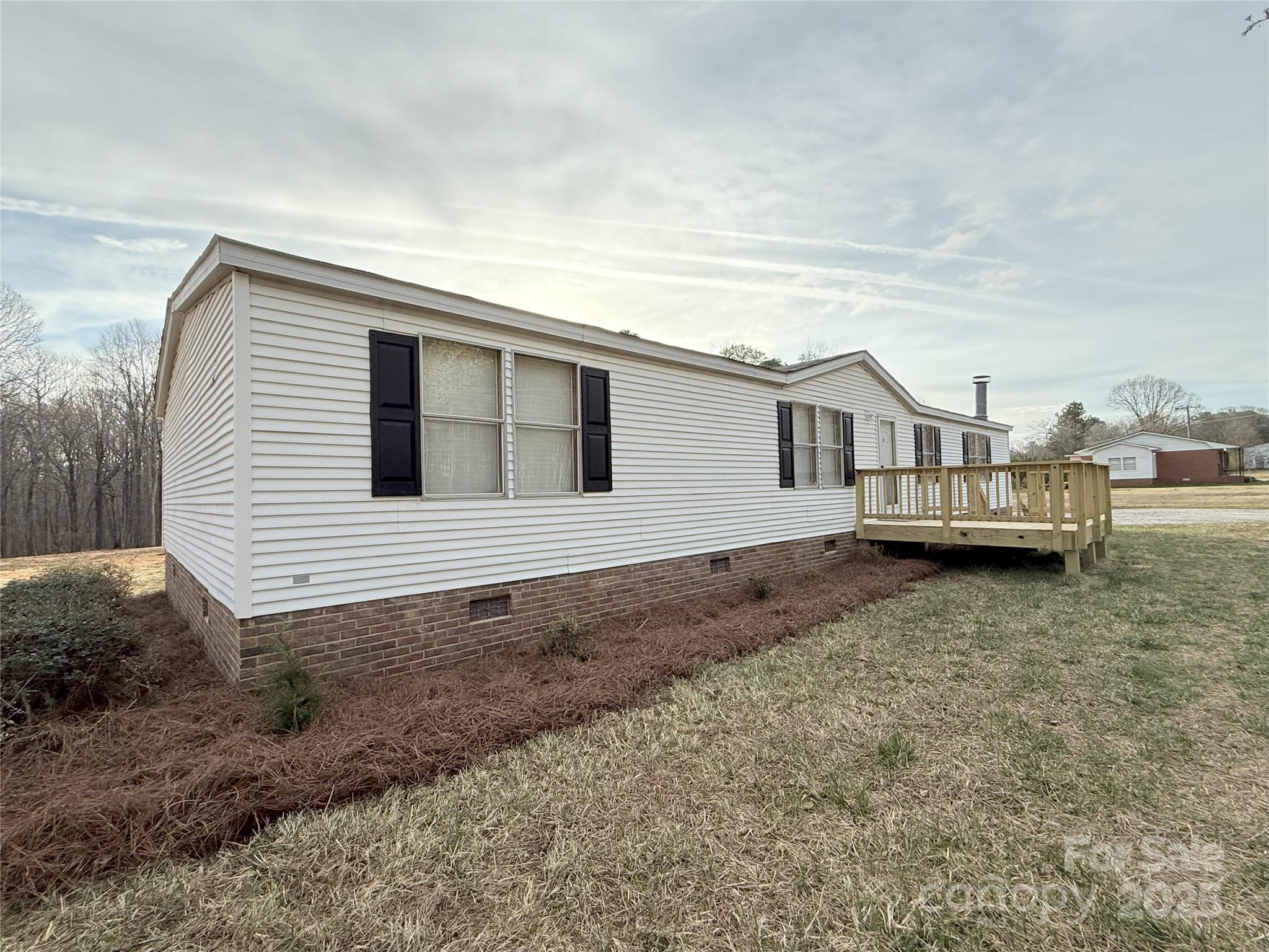 288 John L Hudson Sr Road Lancaster, SC 29720 - Photo 6 of 44 a view of a house with a backyard