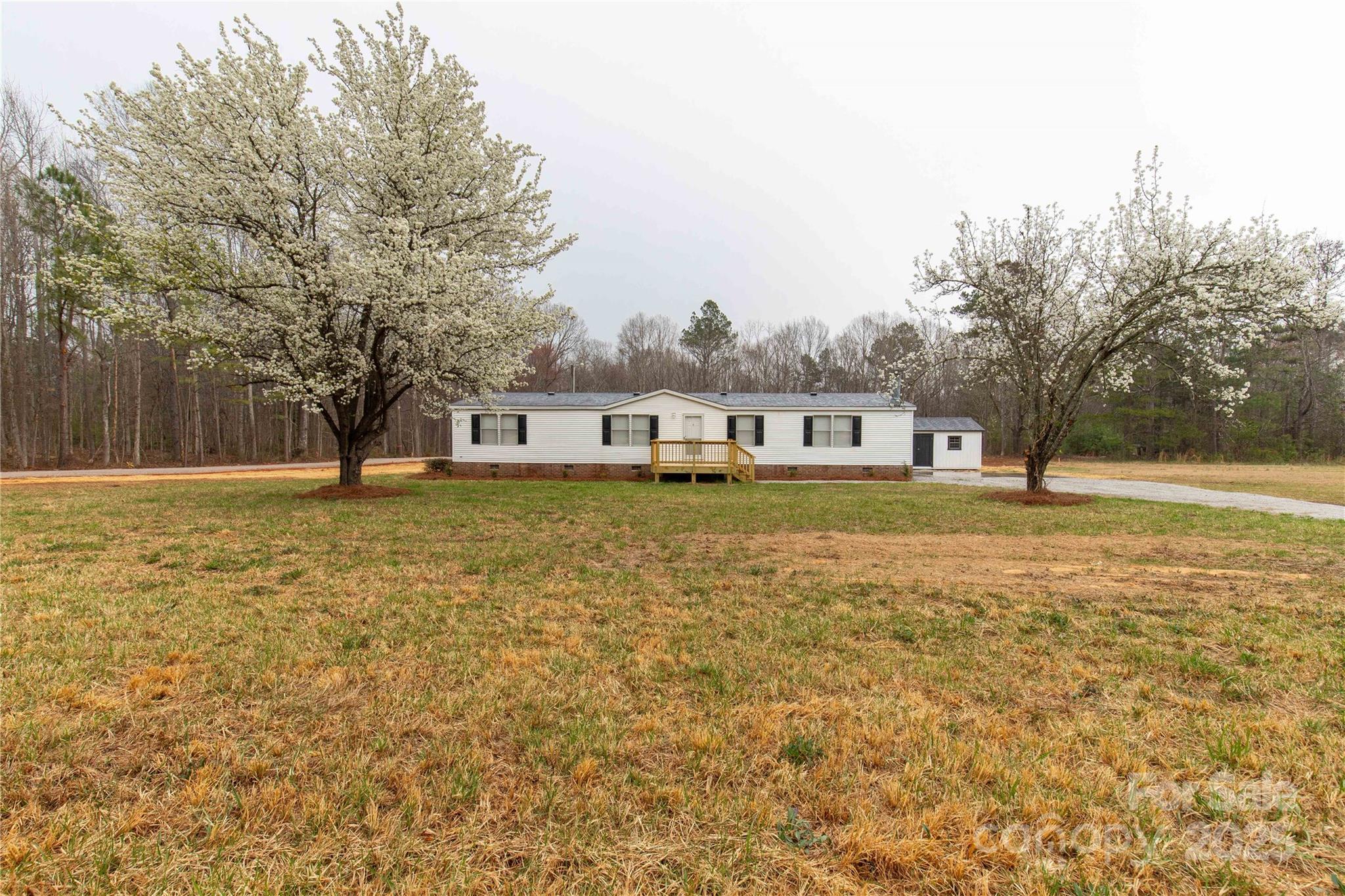 288 John L Hudson Sr Road Lancaster, SC 29720 - Photo 7 of 44 a house view with swimming pool in front of it
