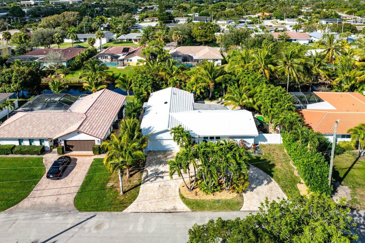 605 Northwest 10th Court Boca Raton, FL 33486 - Photo 29 of 30 Circular paver driveway