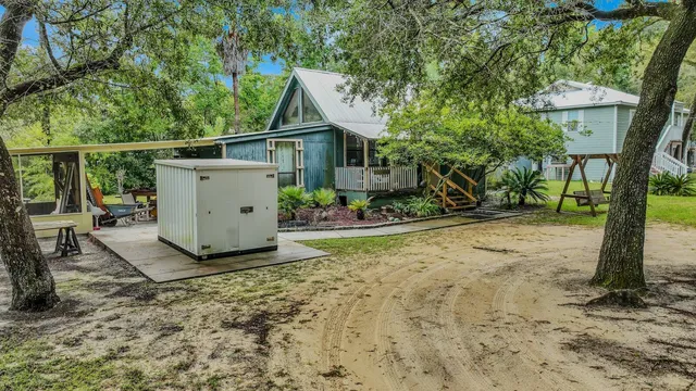 a backyard of a house with lots of green space
