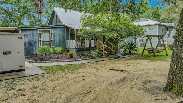 a small swimming pool is sitting in the middle of a lake