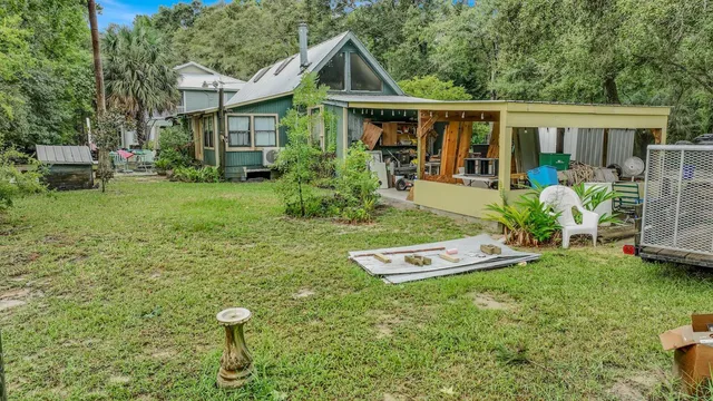 a view of a garden with an outdoor space