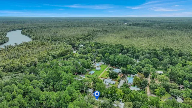 a view of a field with an ocean