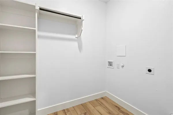 a view of small space with racks on the wall