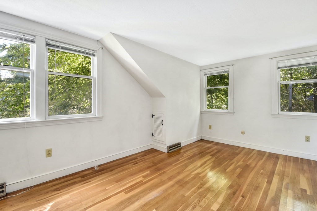 28 Olde Farms Road Boxford, MA 01921 - Photo 24 of 42 a view of empty room with wooden floor and fan