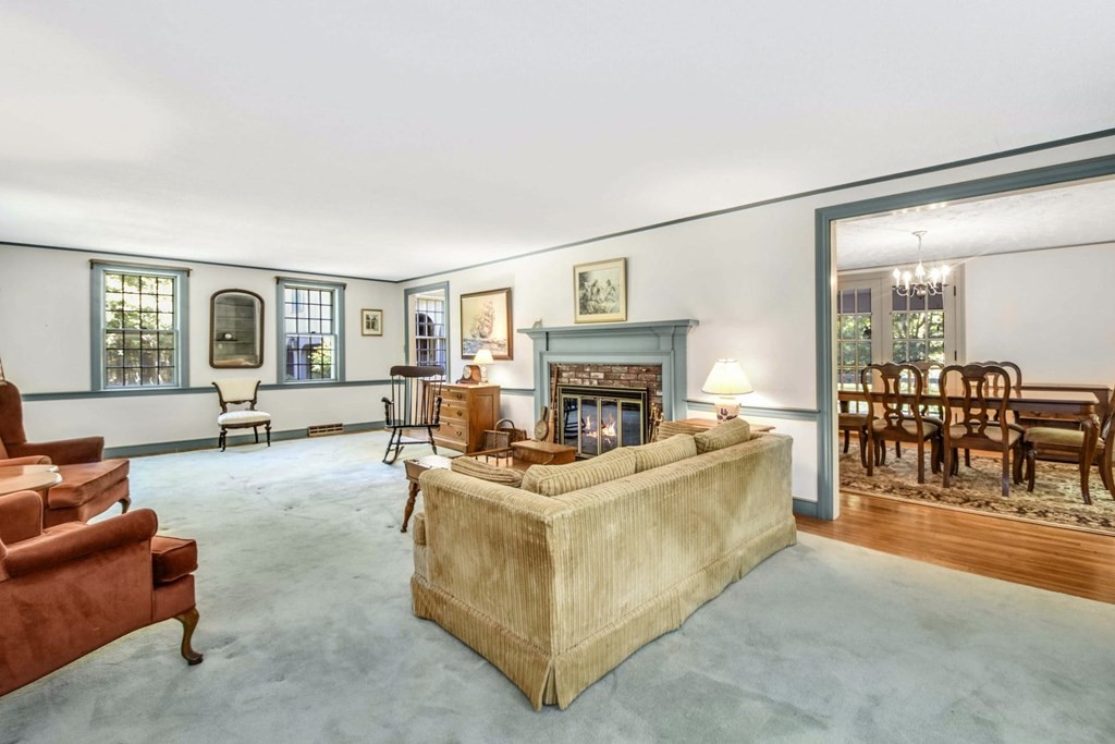 28 Olde Farms Road Boxford, MA 01921 - Photo 6 of 42 a living room with furniture and a fireplace