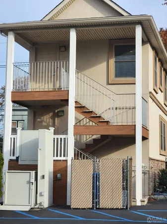 a front view of a house with a garage