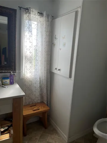 a bathroom with a toilet