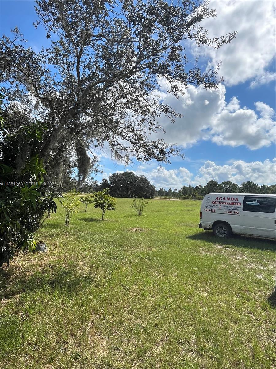 105 Farrer Road Frostproof, FL 33843 - Photo 33 of 48 a view of a garden with an apartment