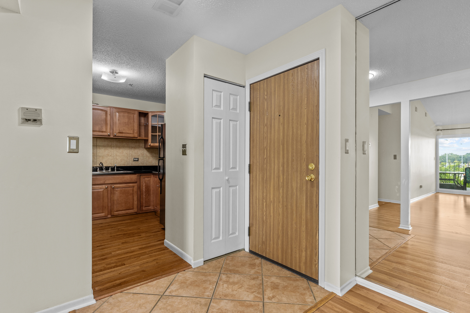 720 Weidner Road, Unit 302 Buffalo Grove, IL 60089 - Photo 11 of 27 a view of kitchen with windows and refrigerator