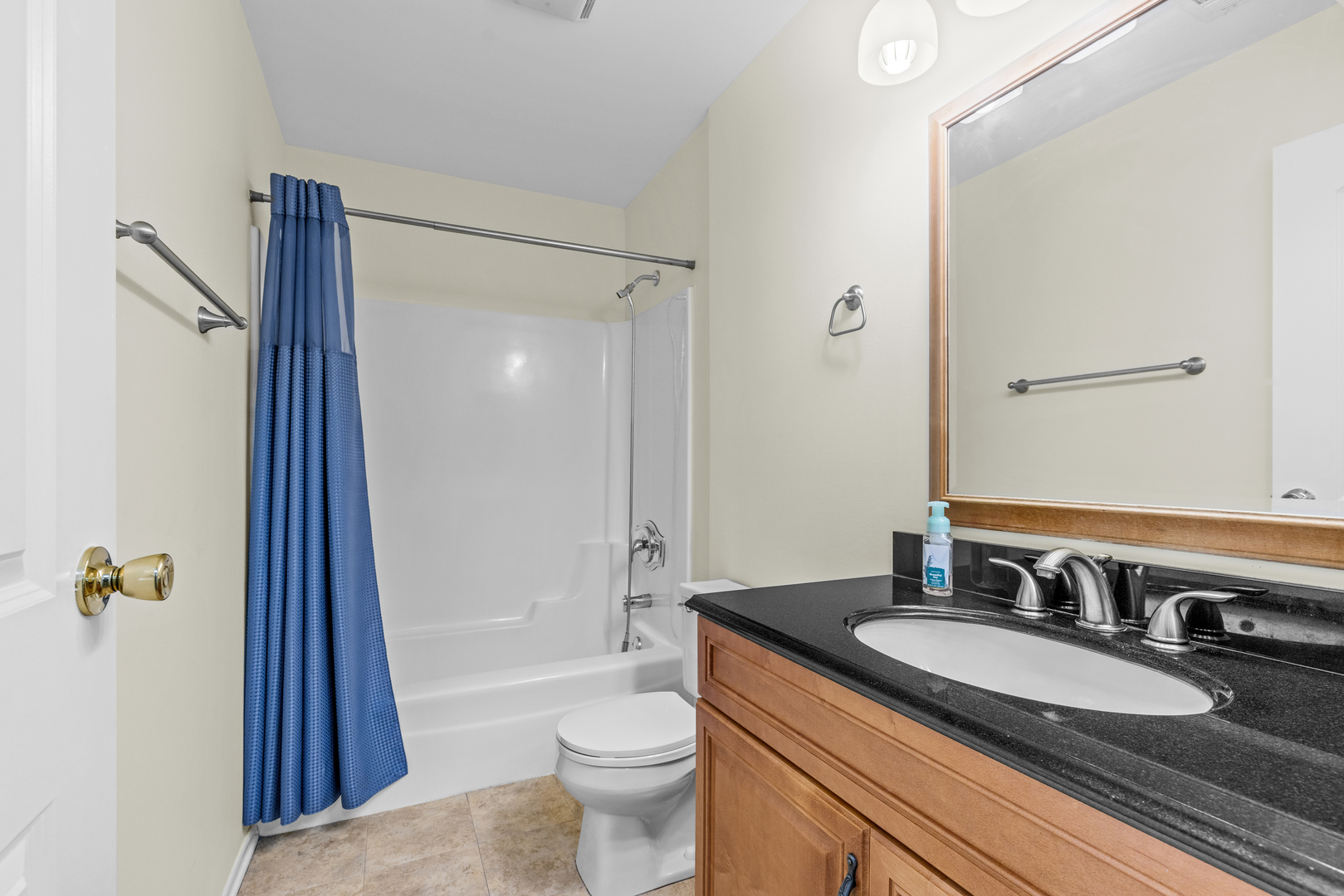 720 Weidner Road, Unit 302 Buffalo Grove, IL 60089 - Photo 22 of 27 a bathroom with a granite countertop sink toilet and shower