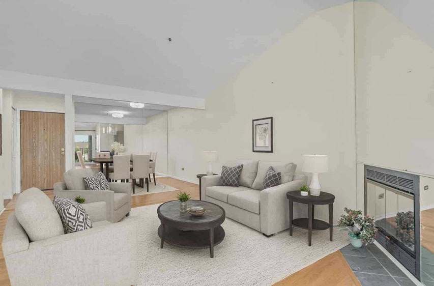 720 Weidner Road, Unit 302 Buffalo Grove, IL 60089 - Photo 8 of 27 a living room with furniture and a wooden floor