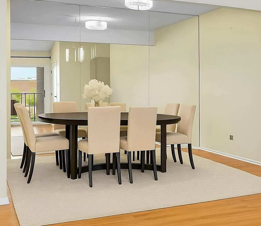 720 Weidner Road, Unit 302 Buffalo Grove, IL 60089 - Photo 10 of 27 a view of a dining room with furniture and wooden floor