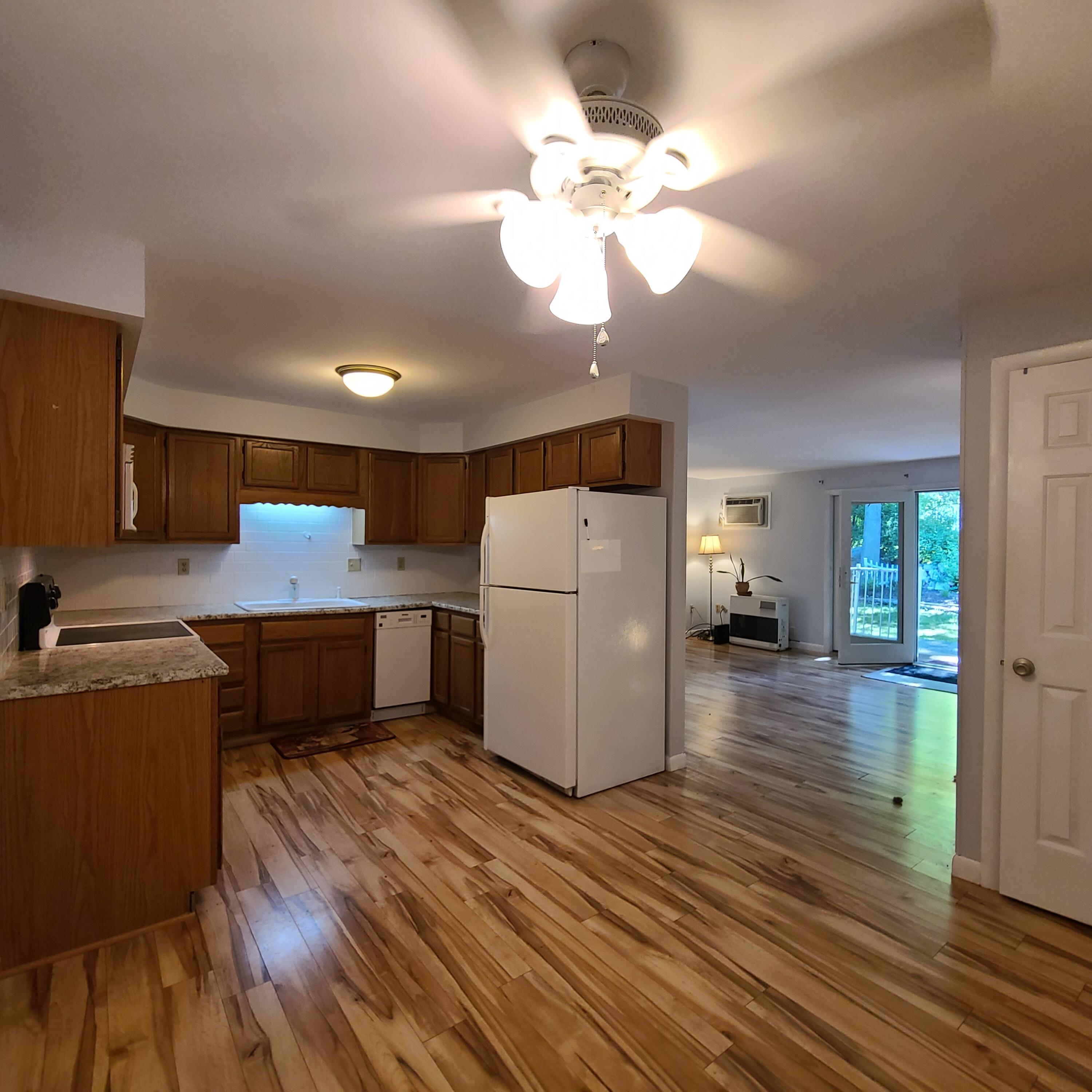 136 Old Winthrop Road, Unit 3 Augusta, ME 04330 - Photo 2 of 27 Dining/kitchen to living room