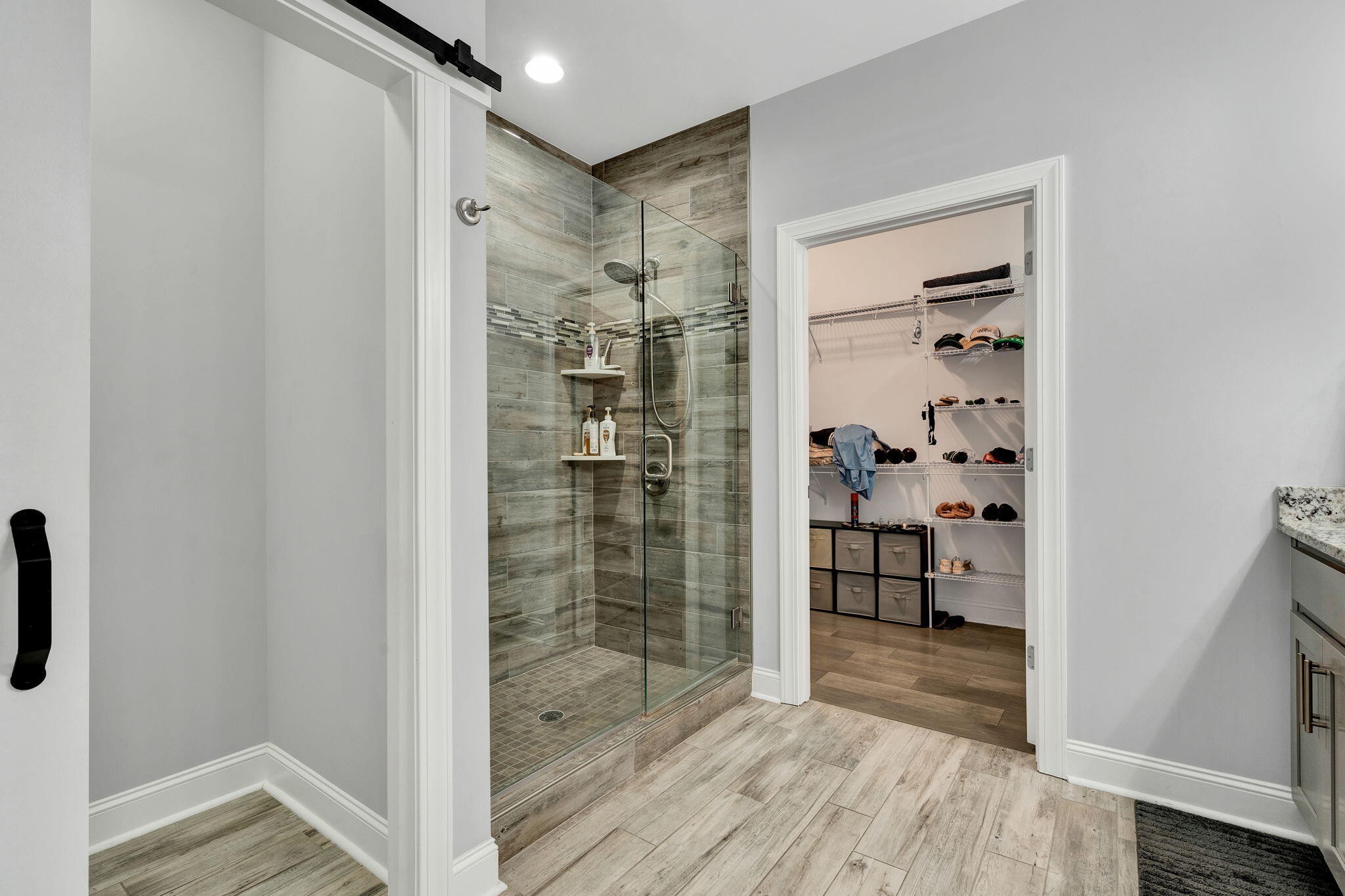 133 Camden Way Dalton, GA 30721 - Photo 18 of 39 a bathroom with a glass shower door