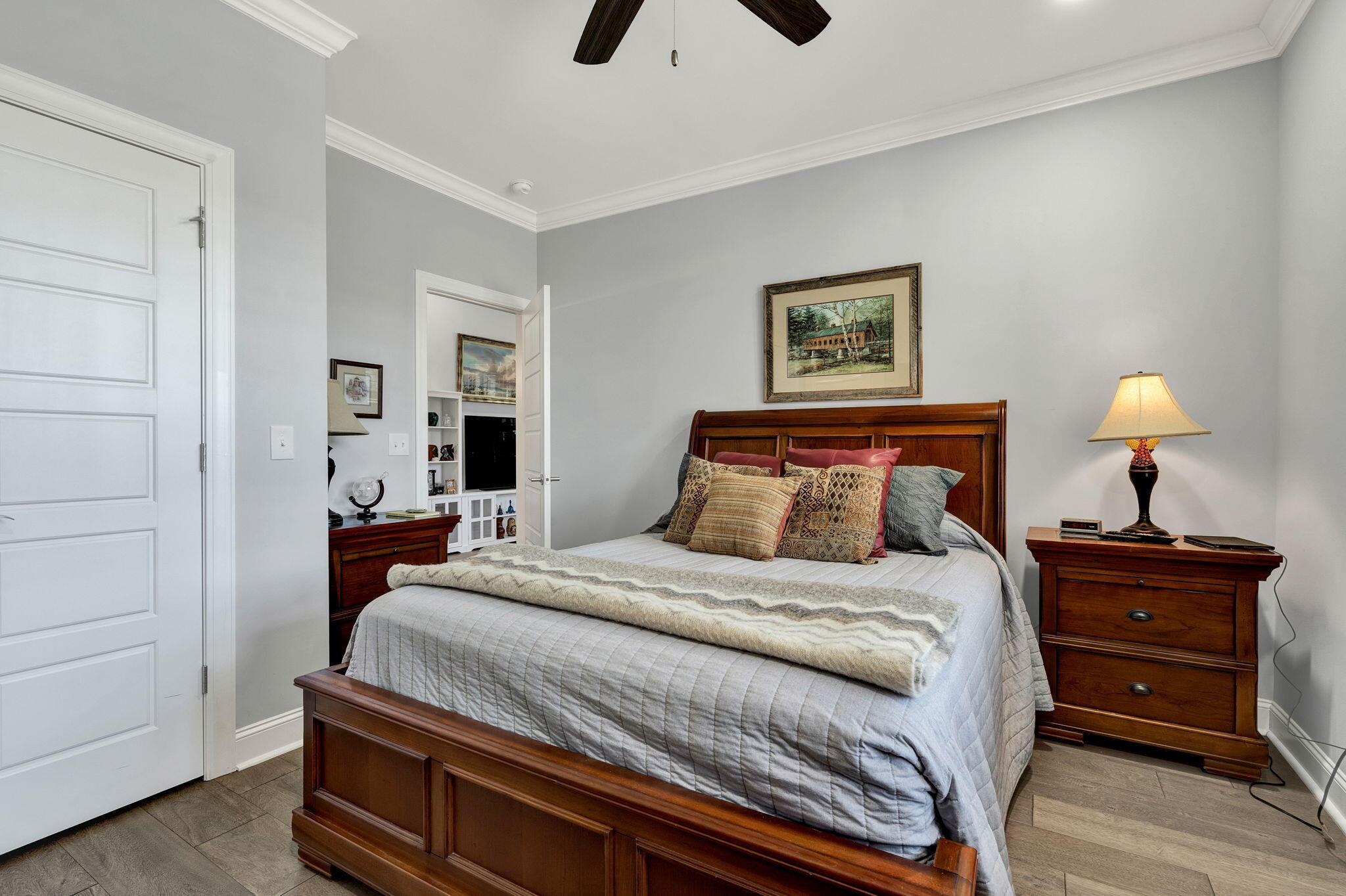 133 Camden Way Dalton, GA 30721 - Photo 22 of 39 a bedroom with a bed and a chandelier