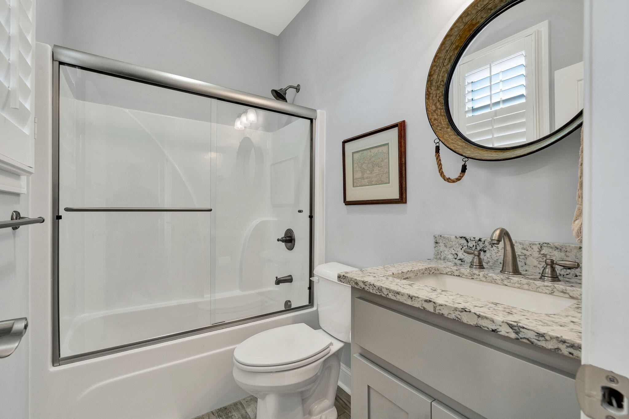 133 Camden Way Dalton, GA 30721 - Photo 24 of 39 a bathroom with a granite countertop sink toilet and a mirror