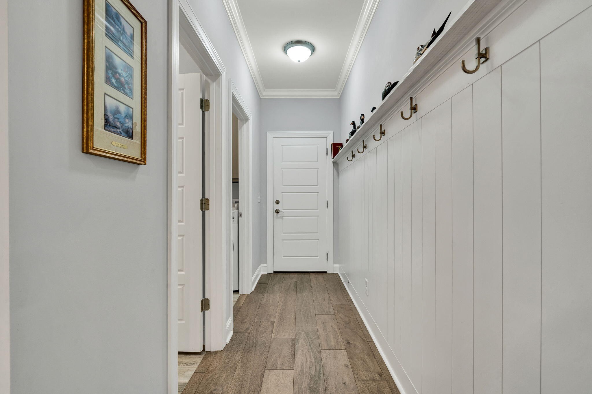133 Camden Way Dalton, GA 30721 - Photo 26 of 39 a view of a hallway with wooden floor and staircase