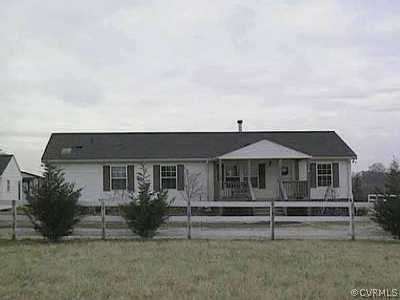 20083 Beaver Dam Road Beaverdam, VA 23015 - Photo 1 of 1 a front view of a house with a yard