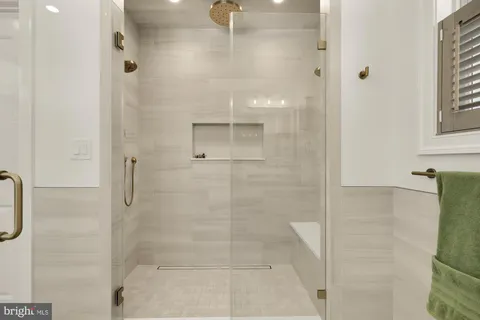 a bathroom with a sink and washing machine