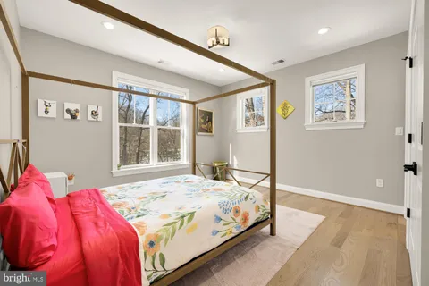 a bedroom with a bed and a view of bathroom