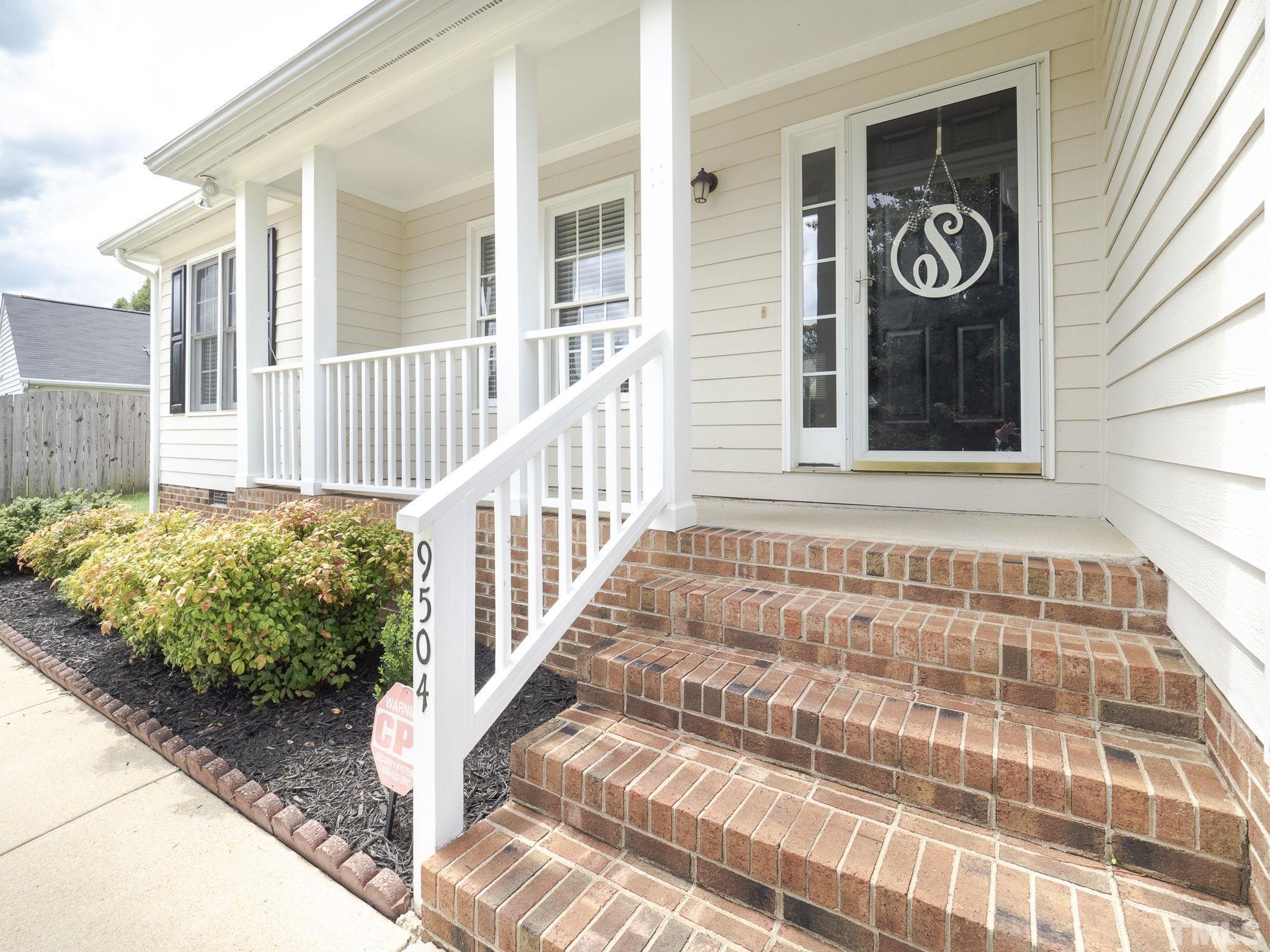 9504 Dawnshire Road Raleigh, NC 27615 - Photo 4 of 30 a view of a front door of house