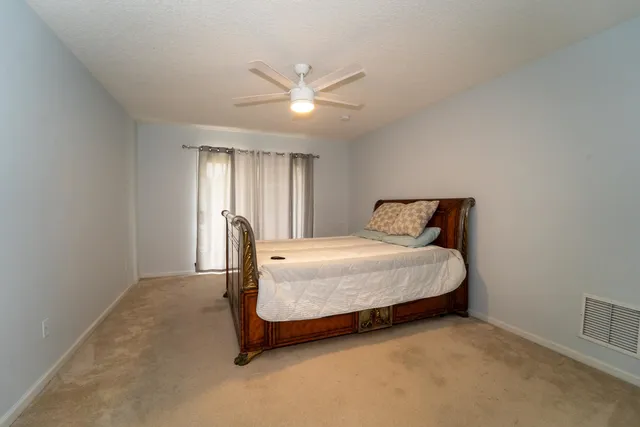 a front view of a house with a swimming pool