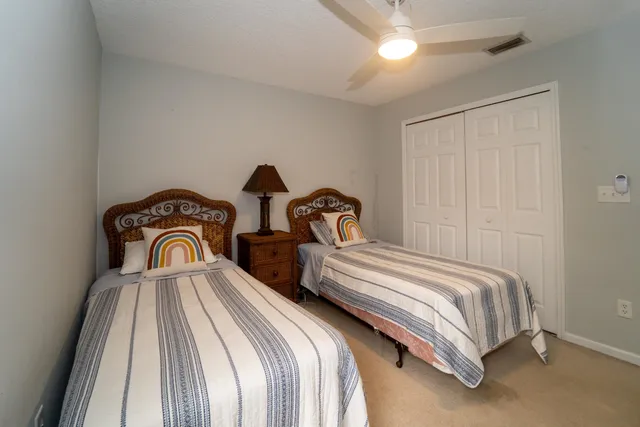an aerial view of house with yard swimming pool and outdoor seating