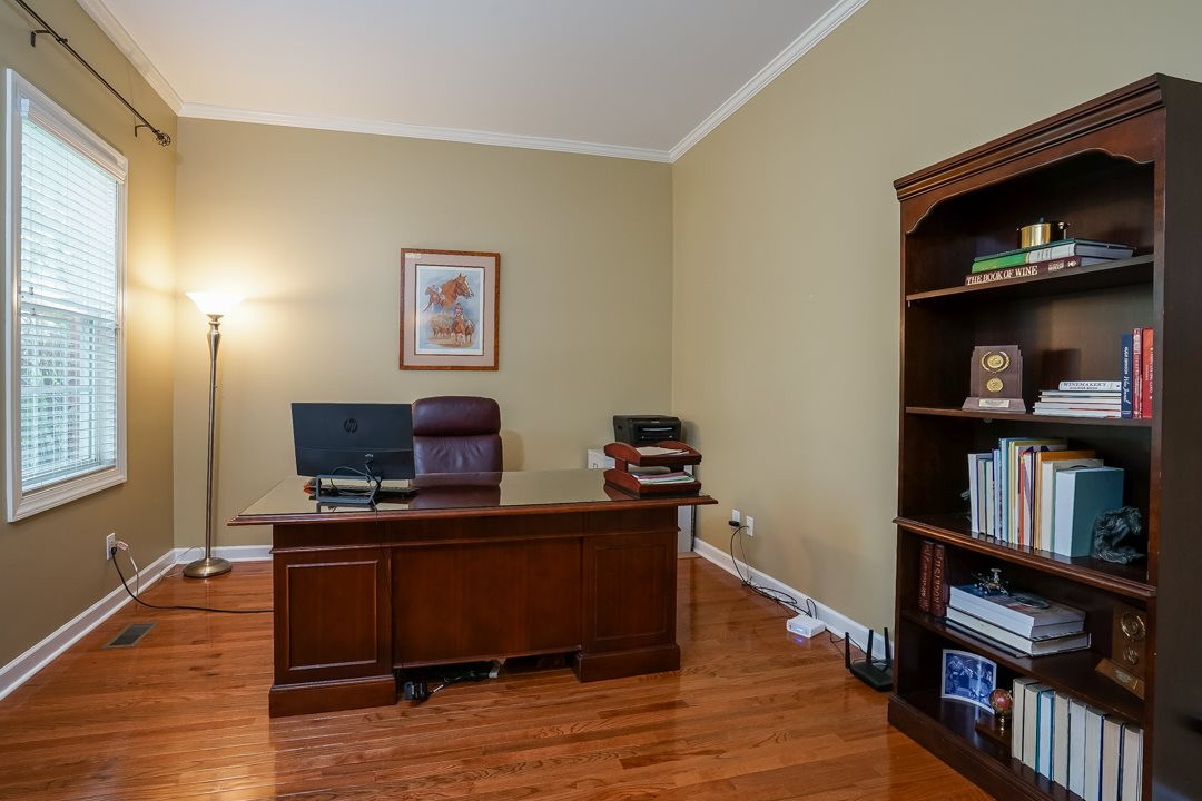 This room off the front foyer could be an office, study, music room, formal living room... so many possibilities!