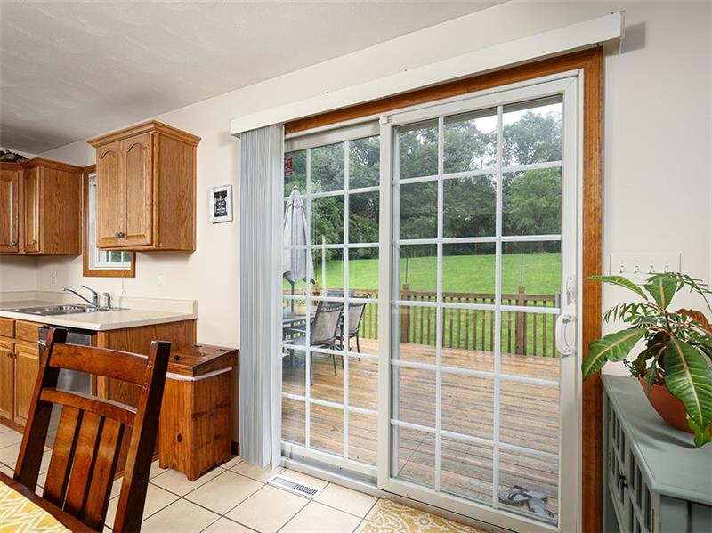 439 Long Road Pittsburgh, PA 15235 - Photo 8 of 24 Sliding glass door to huge rear deck