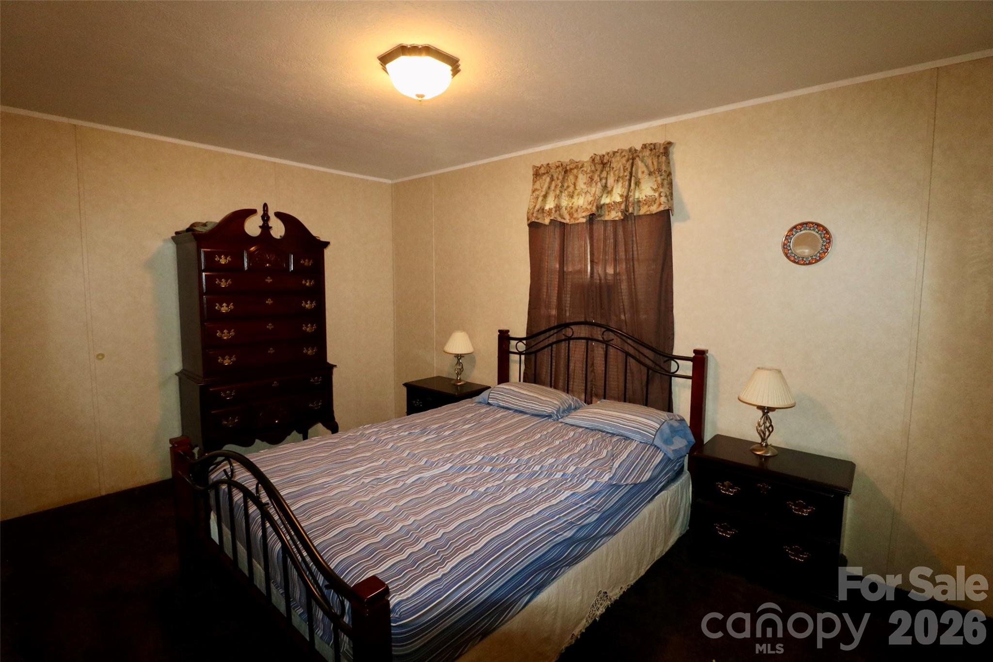 116 Sienna Court Grover, NC 28073 - Photo 13 of 19 a bedroom with a bed and a dresser