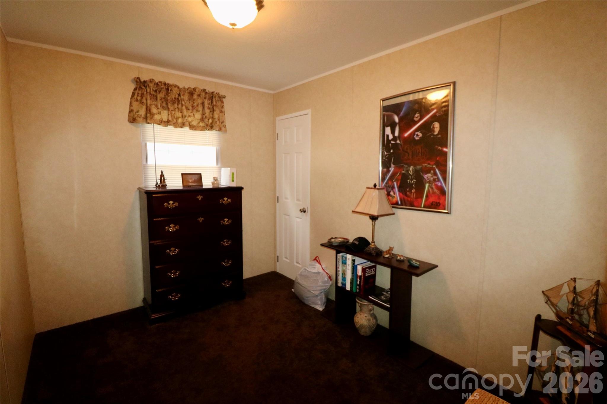 116 Sienna Court Grover, NC 28073 - Photo 16 of 19 a view of a workspace with furniture and a window
